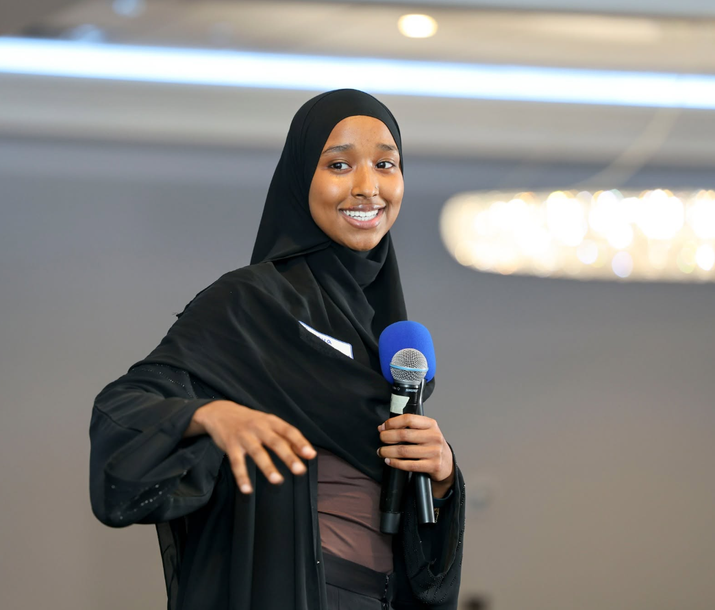 Presenter speaking to an audience at an SSE event